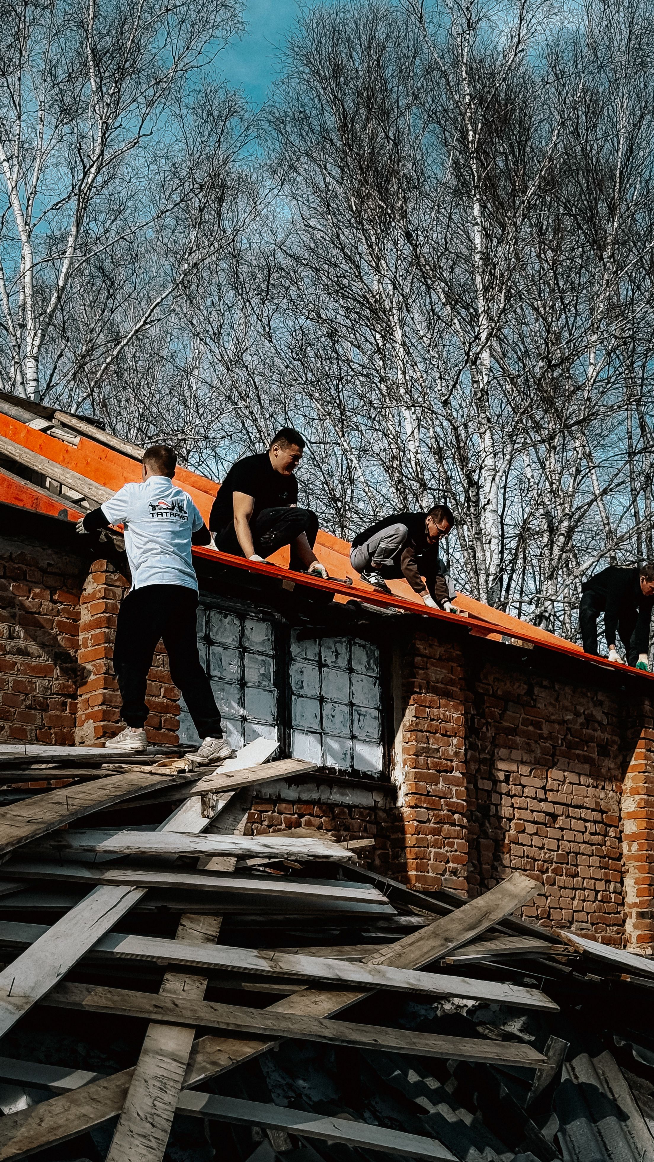 Professional roofing work on a residential building